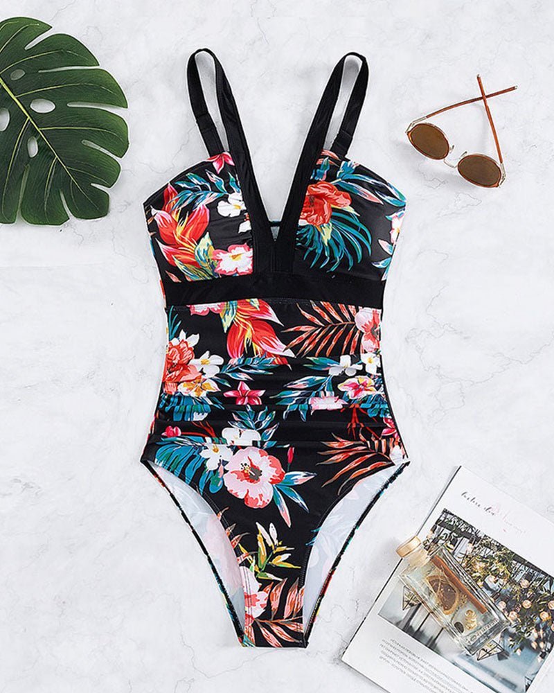 Nessa floral charm swimsuit with V-neckline and floral print in multiple colours
