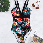 Nessa floral charm swimsuit with V-neckline and floral print in multiple colours