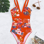 Nessa floral charm swimsuit with V-neckline and floral print in multiple colours