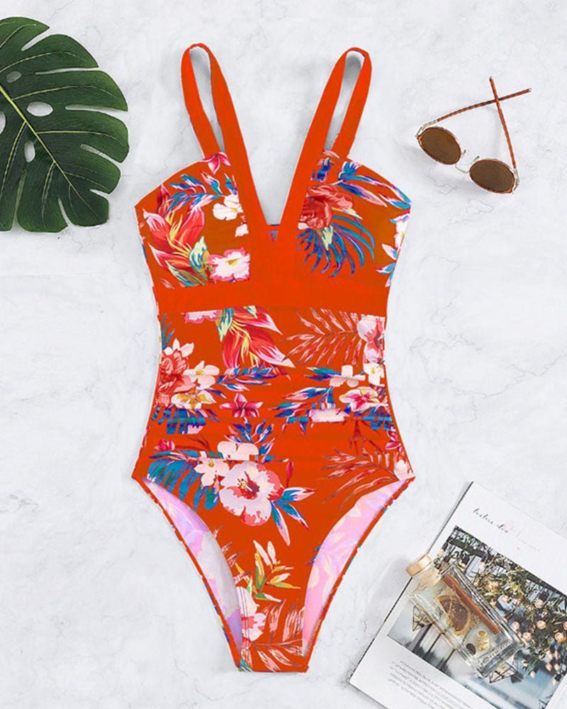Nessa floral charm swimsuit with V-neckline and floral print in multiple colours