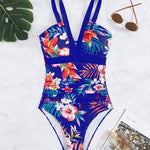Nessa floral charm swimsuit with V-neckline and floral print in multiple colours