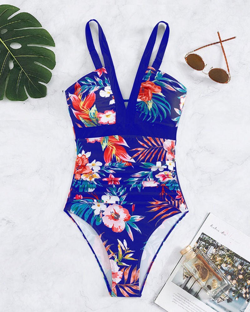 Nessa floral charm swimsuit with V-neckline and floral print in multiple colours