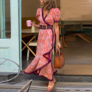 Viana pink A-line maxi dress with V-neckline and short sleeves, flowing floor-length skirt