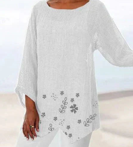 Luisa floral plus size blouse with soft V-neckline and relaxed silhouette