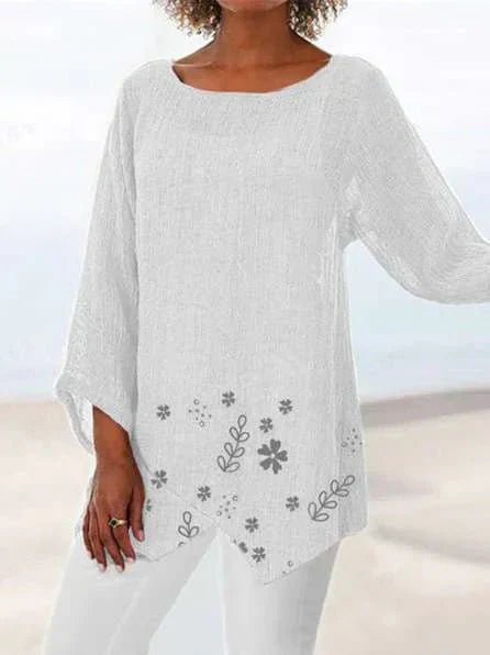 Luisa floral plus size blouse with soft V-neckline and relaxed silhouette