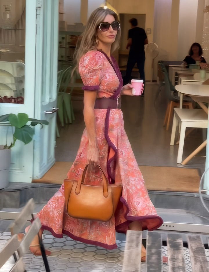 Viana pink A-line maxi dress with V-neckline and short sleeves, flowing floor-length skirt