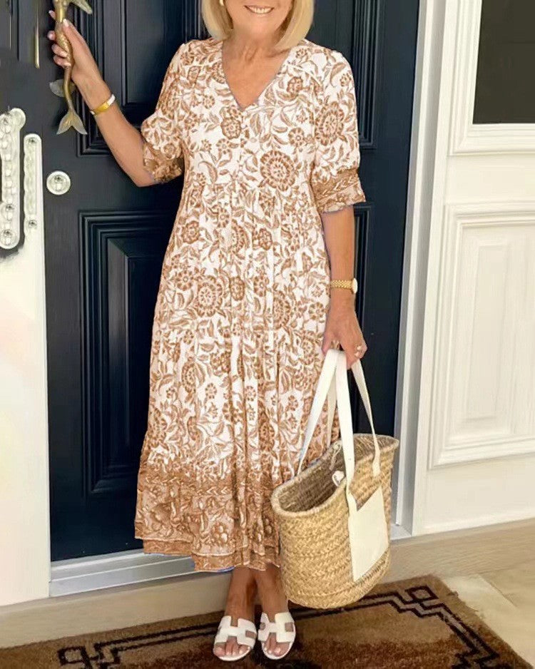 Keisha graceful V-neck floral dress shown in a soft feminine silhouette