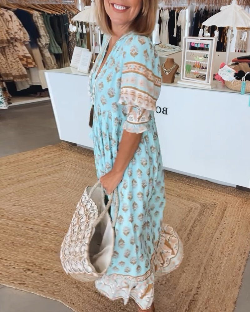 Mana floral v-neck dress shown in blue, green and pink