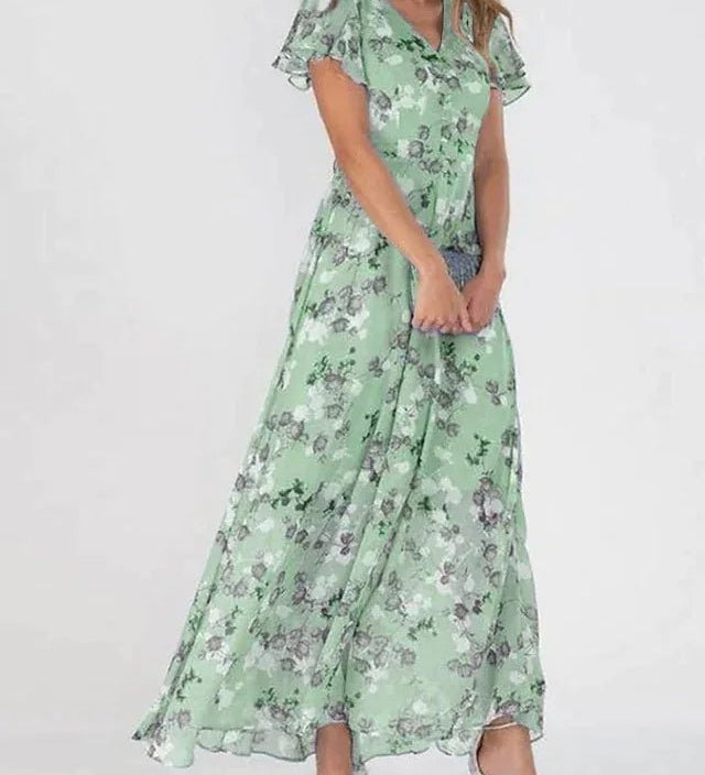 Zuri glamorous tummy-flattering dress in vibrant colour, styled for summer occasions