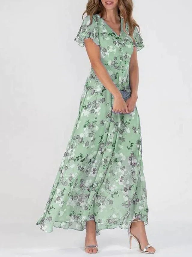 Zuri glamorous tummy-flattering dress in vibrant colour, styled for summer occasions