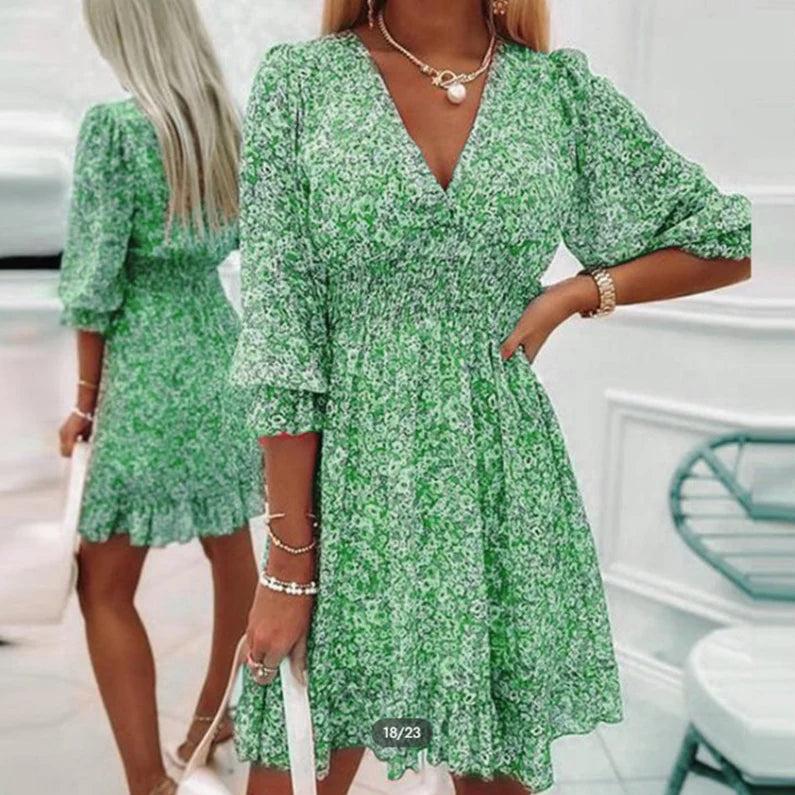 Sunna elegant floral dress with a flattering feminine silhouette