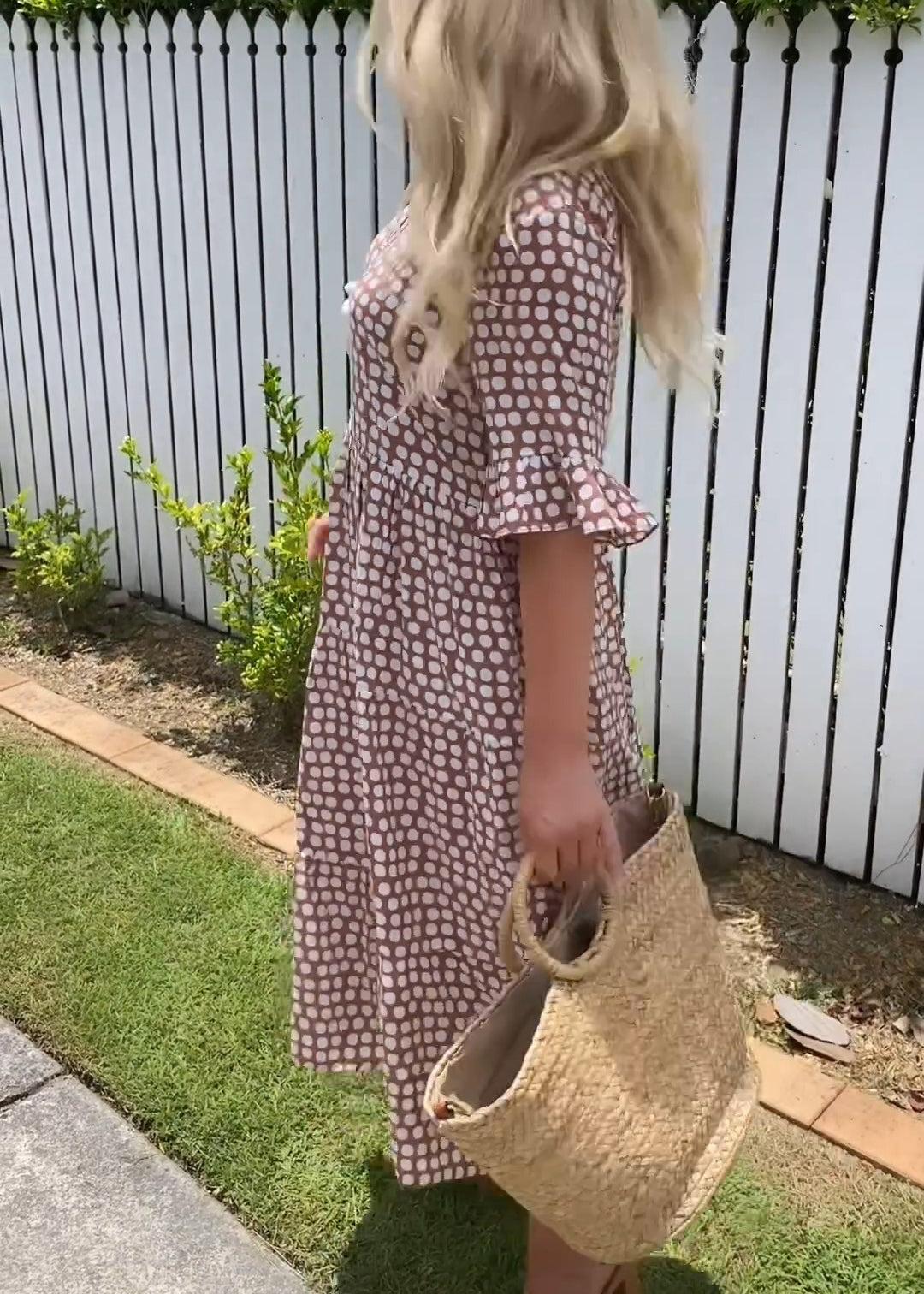 Zora short-sleeve summer midi dress in a relaxed, flowing silhouette