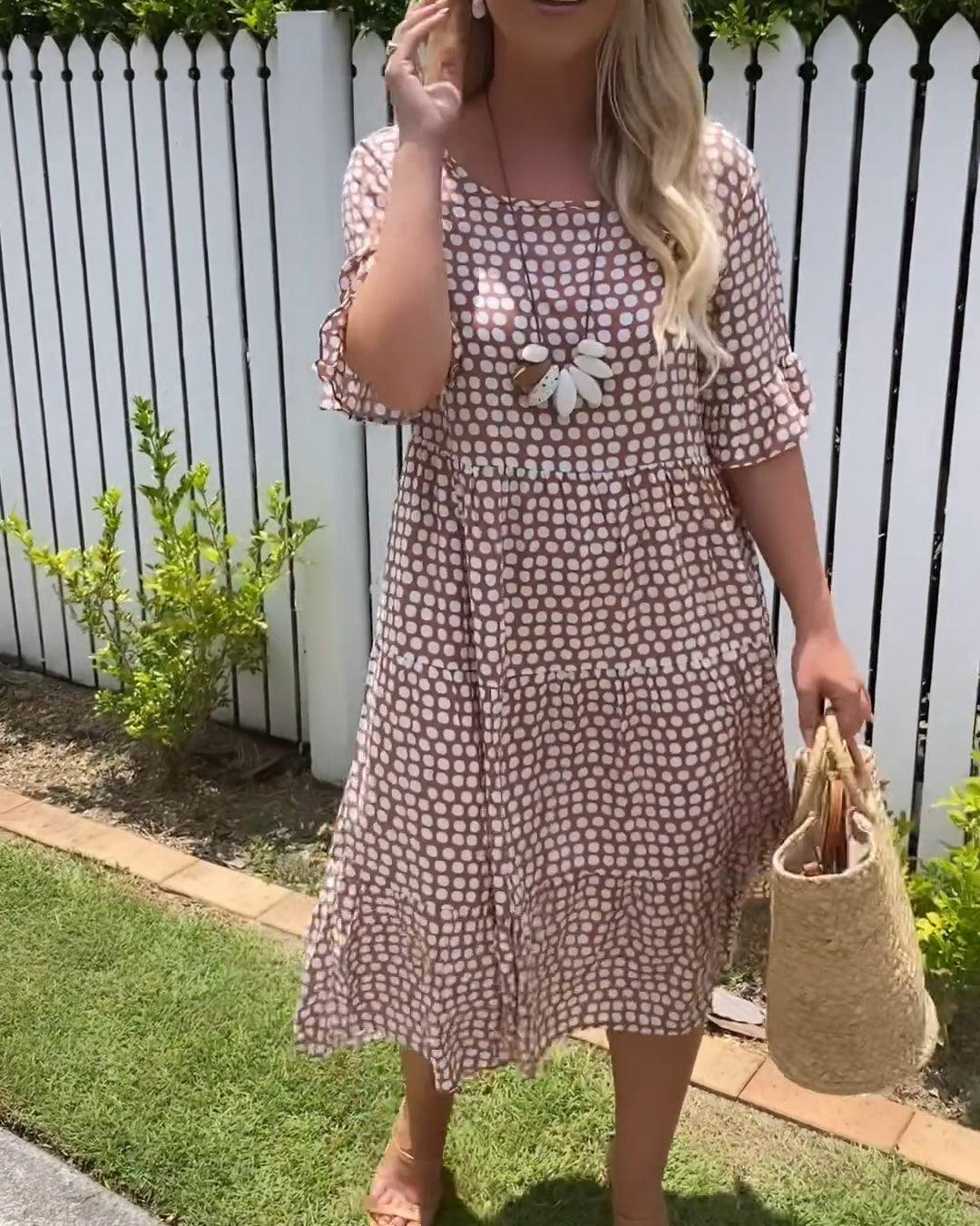 Zora short-sleeve summer midi dress in a relaxed, flowing silhouette