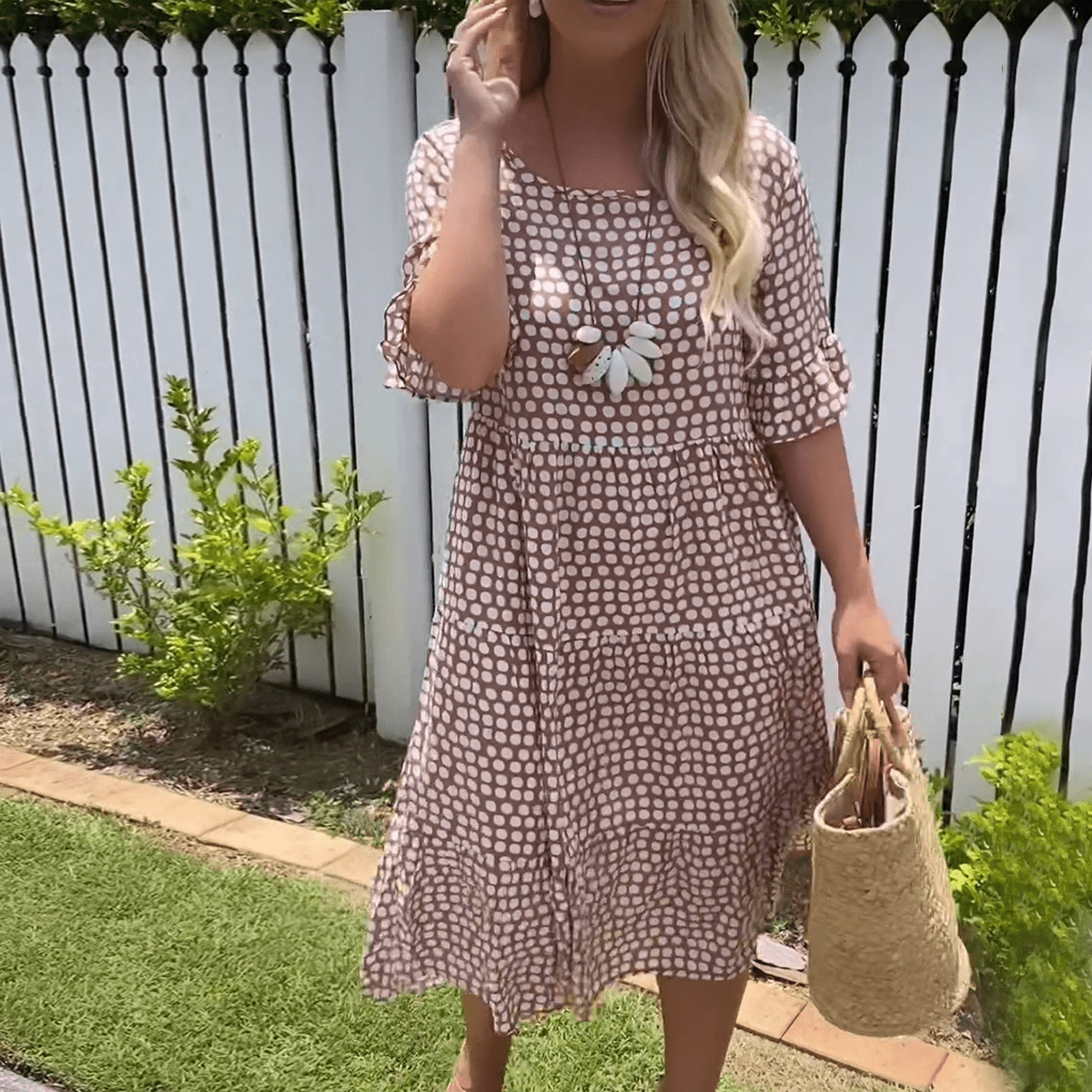 Zora short-sleeve summer midi dress in a relaxed, flowing silhouette