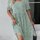 Anne elegant bloom midi dress in blue, red and green with a flattering feminine silhouette