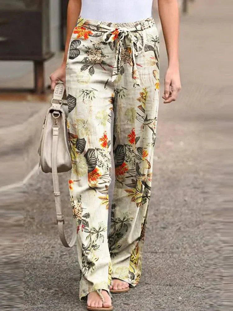 Dahlia floral print pants shown in a relaxed, everyday silhouette