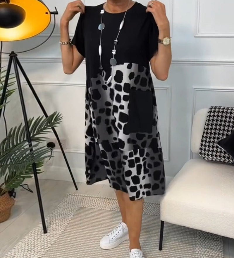 Cassandra women's elegant relaxed-fit midi dress with deep side pockets in a black and stone print