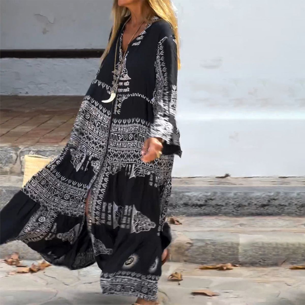 Emy black V-neck dress with elegant bell sleeves and soft flowy drape