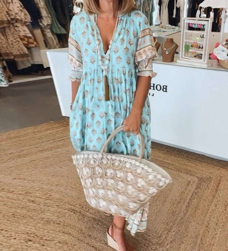 Mana floral v-neck dress shown in blue, green and pink
