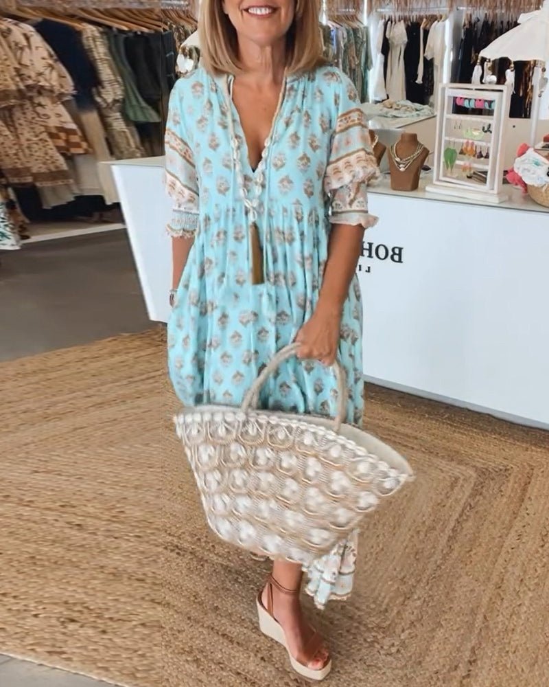 Mana floral v-neck dress shown in blue, green and pink