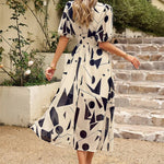 Allison floral midi dress with V-neckline, half sleeves and cinched waist