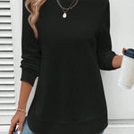 Ynes graceful long sleeve top with a classic round neck and regular fit