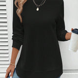 Ynes graceful long sleeve top with a classic round neck and regular fit