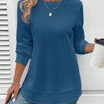 Ynes graceful long sleeve top with a classic round neck and regular fit