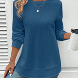 Ynes graceful long sleeve top with a classic round neck and regular fit