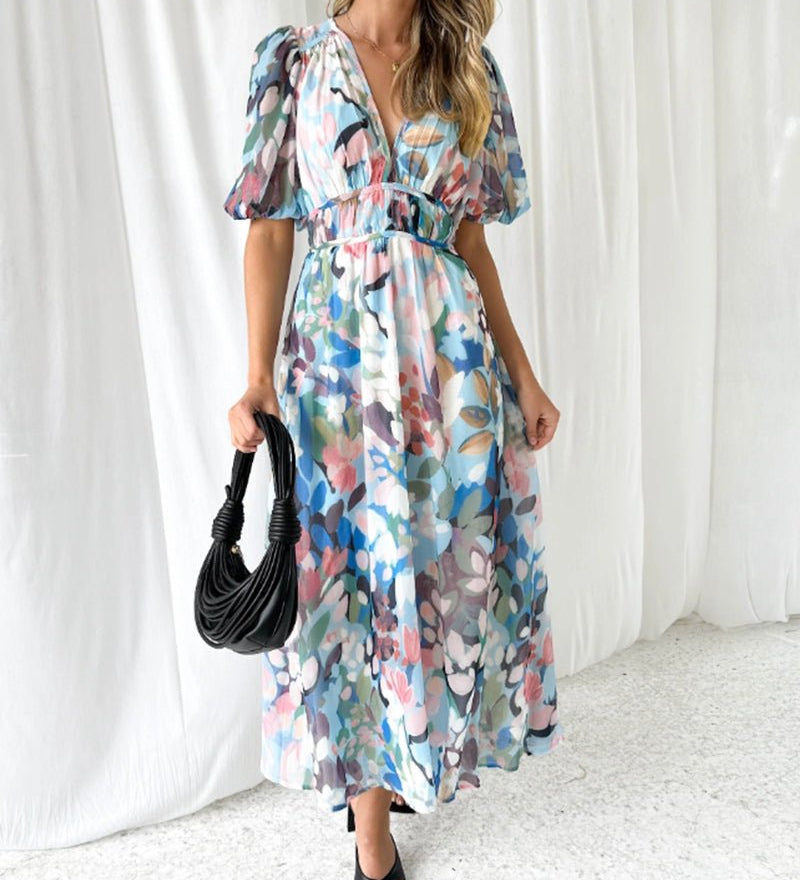 Daliah graceful floral dress with flowing silhouette in green and blue