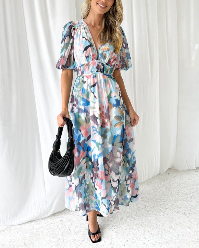 Daliah graceful floral dress with flowing silhouette in green and blue
