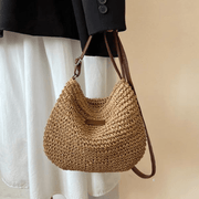 Coralyn woven crossbody bag with adjustable strap in brown