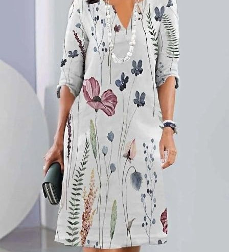 Eleanor floral layered tunic dress with flowing A-line silhouette in navy blue