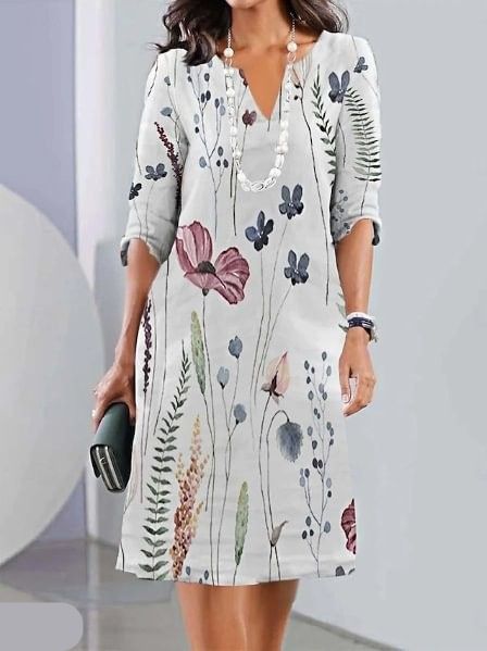 Eleanor floral layered tunic dress with flowing A-line silhouette in navy blue