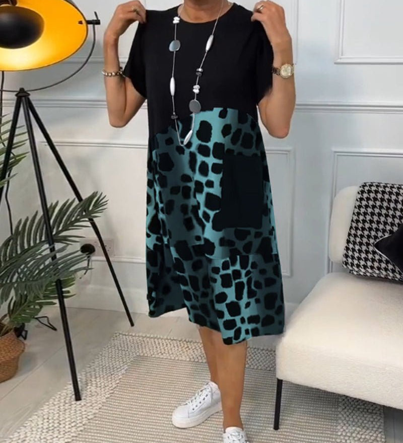 Cassandra women's elegant relaxed-fit midi dress with deep side pockets in a black and stone print