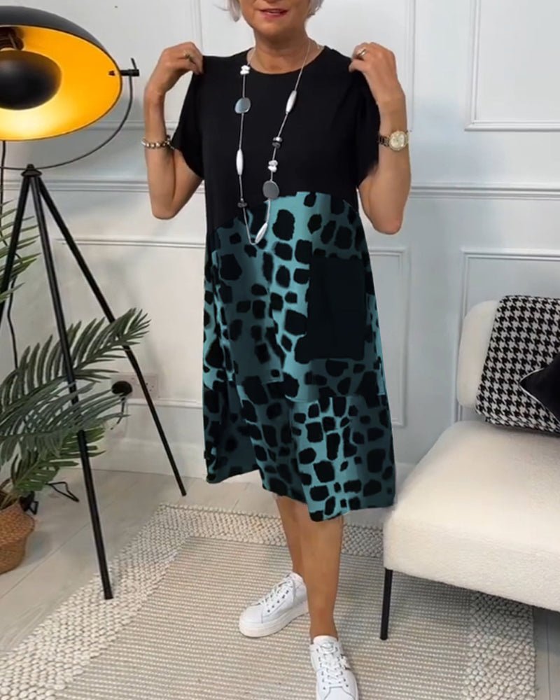 Cassandra women's elegant relaxed-fit midi dress with deep side pockets in a black and stone print