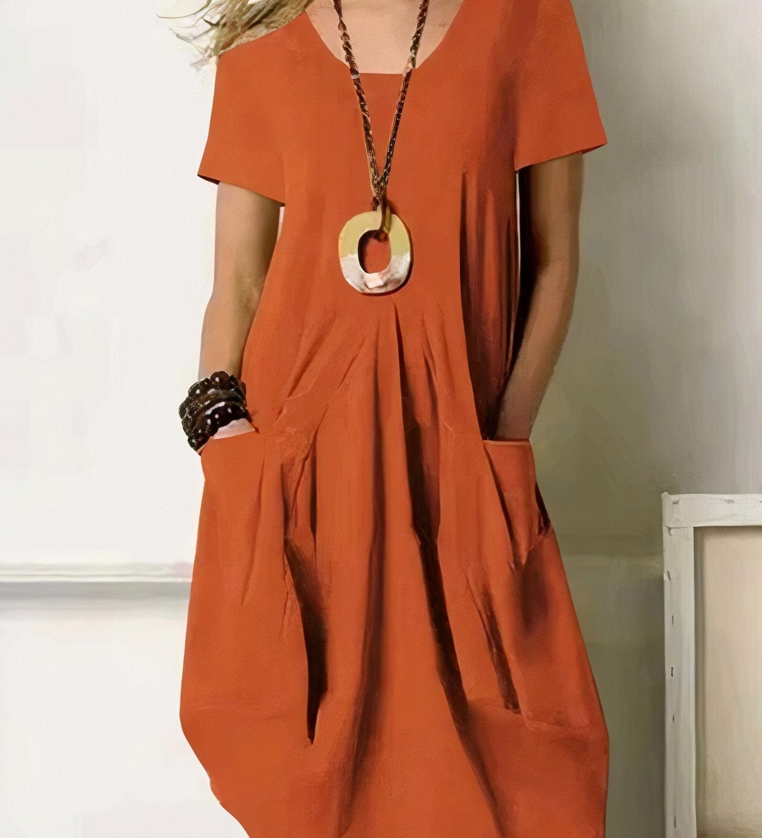 Kwani Easy Casual Flow Dress with round neck, classic sleeves and A-line silhouette