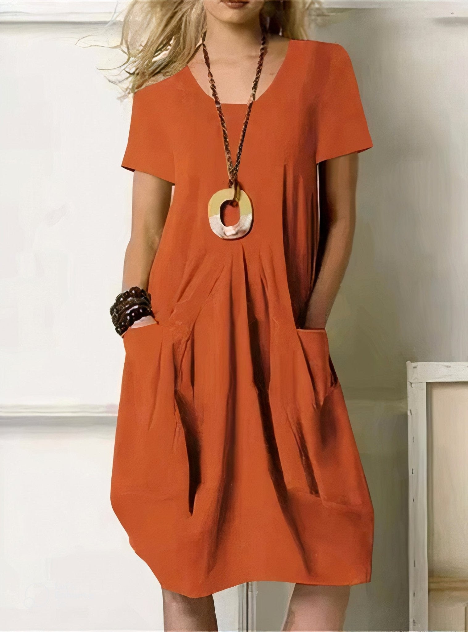 Kwani Easy Casual Flow Dress with round neck, classic sleeves and A-line silhouette