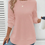 Ynes graceful long sleeve top with a classic round neck and regular fit