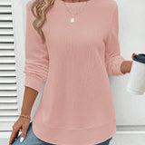 Ynes graceful long sleeve top with a classic round neck and regular fit