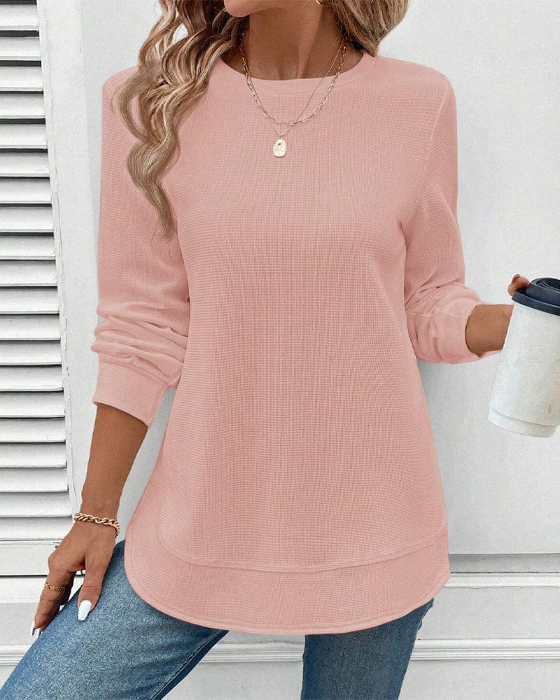 Ynes graceful long sleeve top with a classic round neck and regular fit