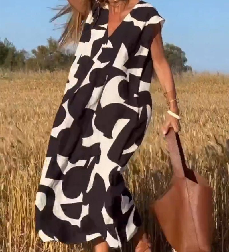 Amelia printed V-neck A-line dress in a flowing silhouette