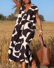 Amelia printed V-neck A-line dress in a flowing silhouette