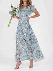 Zuri glamorous tummy-flattering dress in vibrant colour, styled for summer occasions