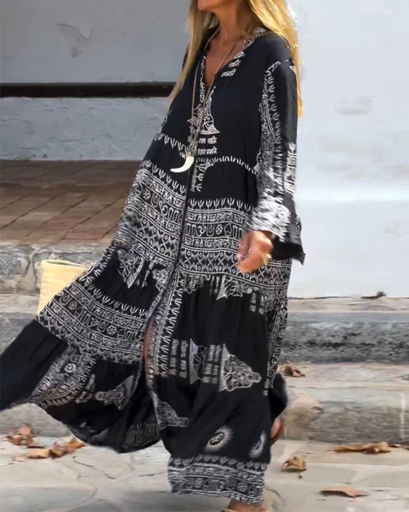 Emy black V-neck dress with elegant bell sleeves and soft flowy drape