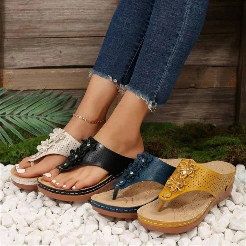 Nami orthopedic wedge sandals shown in white, blue, gold and black