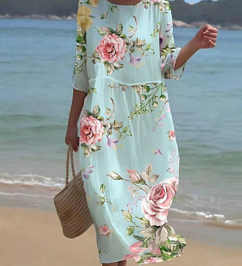 Keely Sunset floral dress in a feminine print, shown in blue floral and green colourways