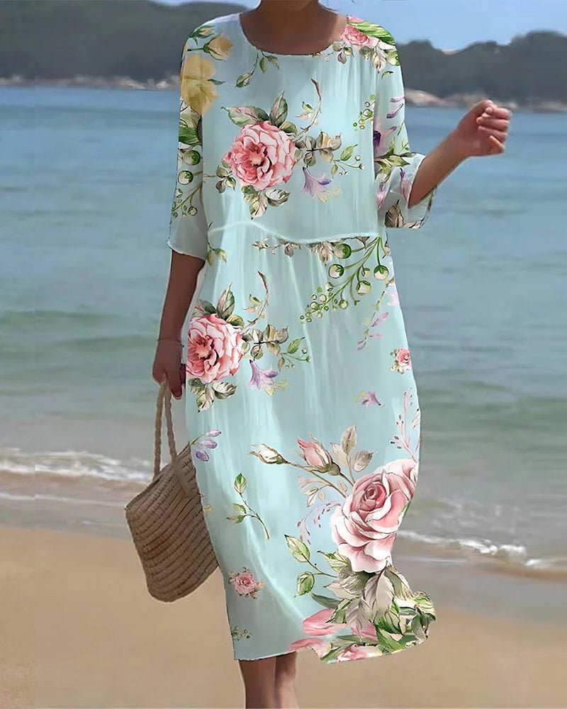 Keely Sunset floral dress in a feminine print, shown in blue floral and green colourways