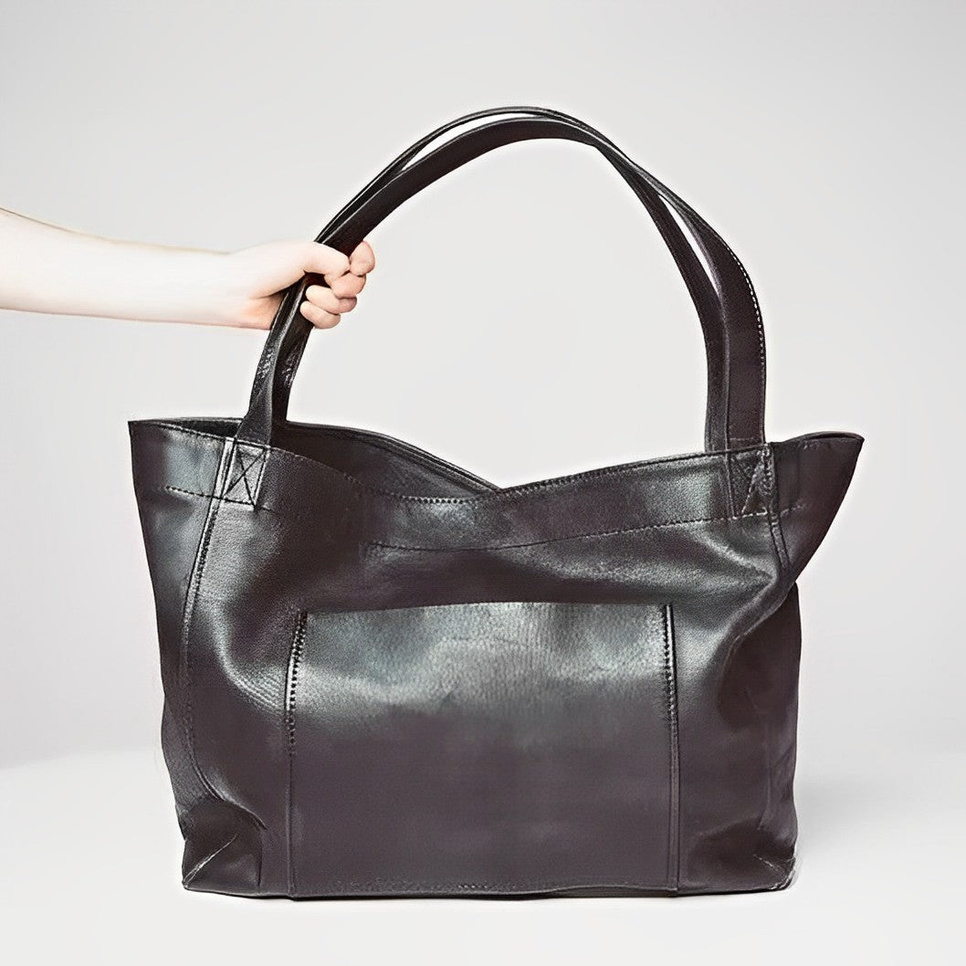Sunset Luxe leather shoulder bag shown in brown, wine and black