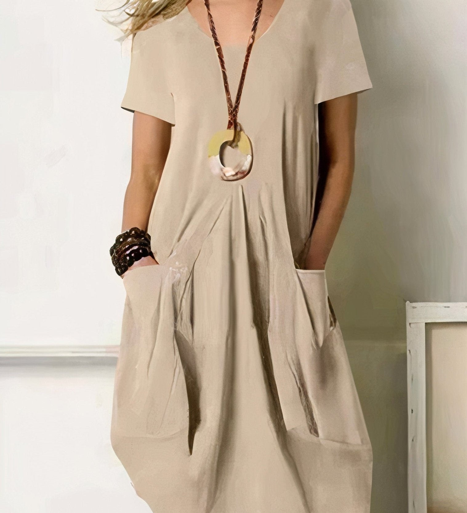 Kwani Easy Casual Flow Dress with round neck, classic sleeves and A-line silhouette